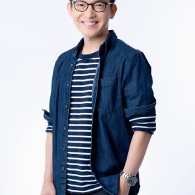 smart attractive asian glasses male standing and smile with freshness and joyful casual blue shirt portrait white background